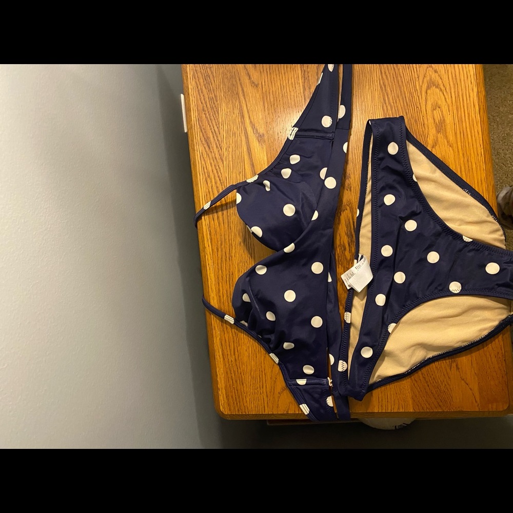 old navy swimming suit, clips in the back but also wraps around and ties